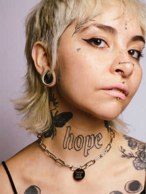 ELEPHANT EGG DONT TELL ME TO SMILE NECKLACE