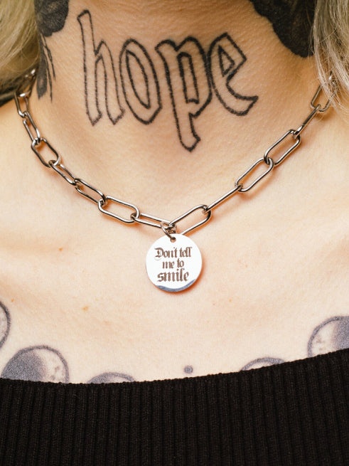 ELEPHANT EGG DONT TELL ME TO SMILE NECKLACE