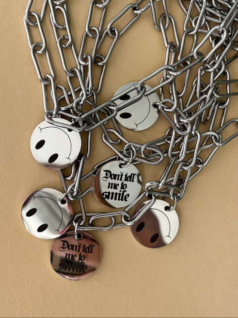 ELEPHANT EGG DONT TELL ME TO SMILE NECKLACE