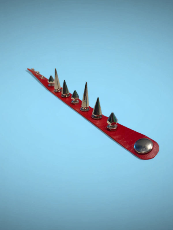 
            
                Load image into Gallery viewer, EXIT BRACELET DIFFERENT SPIKES RED
            
        