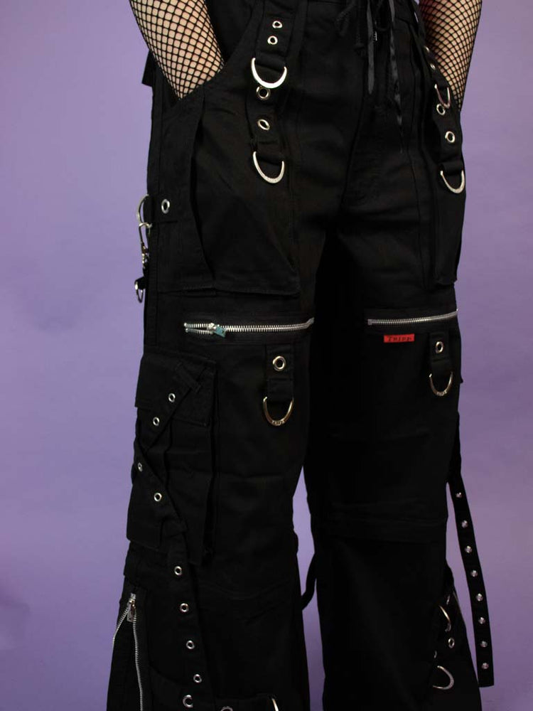 
            
                Bild in den Galerie-Viewer laden,TRIPP NYC X STRAP ZIP OFF PANT BLACK
            
        