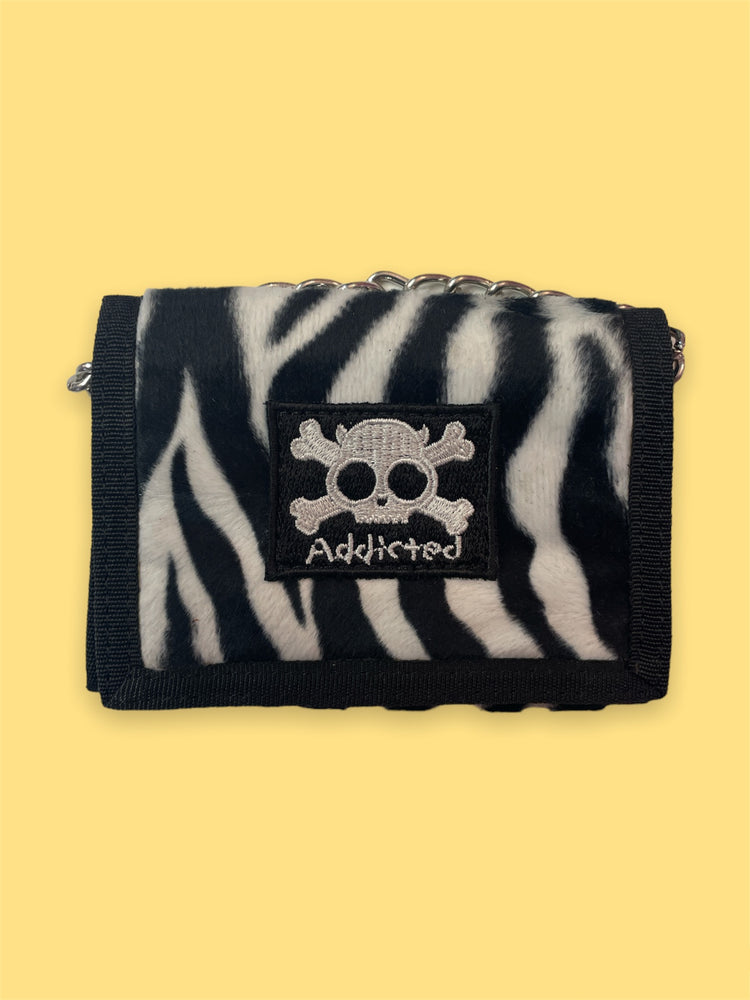 
            
                Load image into Gallery viewer, ADDICTED ZEBRA SKULL WALLET
            
        